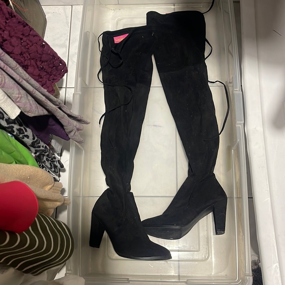 Tall black over the knee boots worn one one time